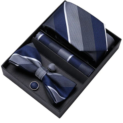 gift set that includes a silk tie, bow tie, cuff links and pocket square