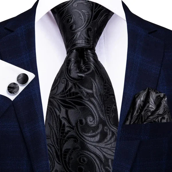 black ties with matching cuff links and pocket square