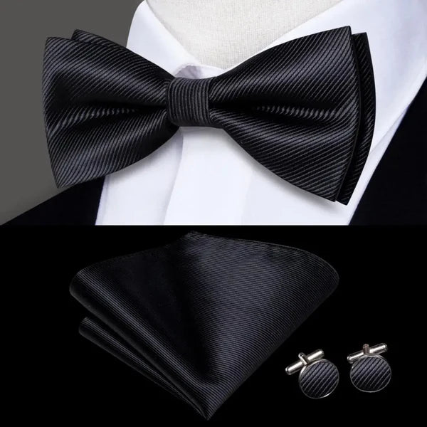 black bow ties with matching cuff links and pocket square