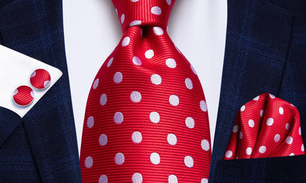 bright red polka dot design tie with matching cuff links and pocket square