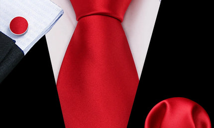 plain bright red tie with cuff links and pocket square