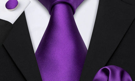 plain purple tie with matching cuff links and pocket square