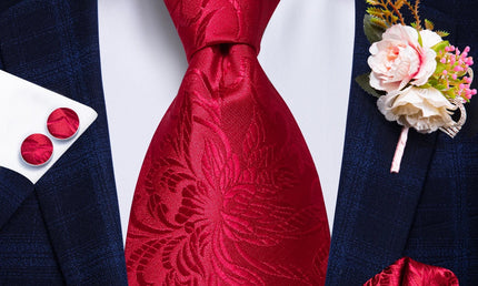red floral pattern tie with matching cuff links and pocket square
